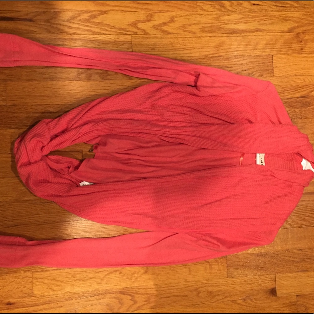 Peach colored long sleeve blouse/sweater